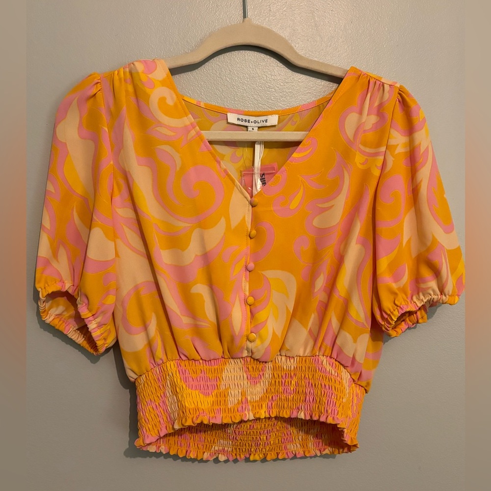 Women’s orange/pink short sleeve relaxed crop top. Size: Small. New with tags